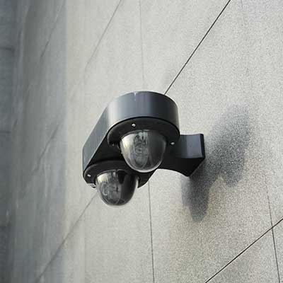Black security camera with motion sensor